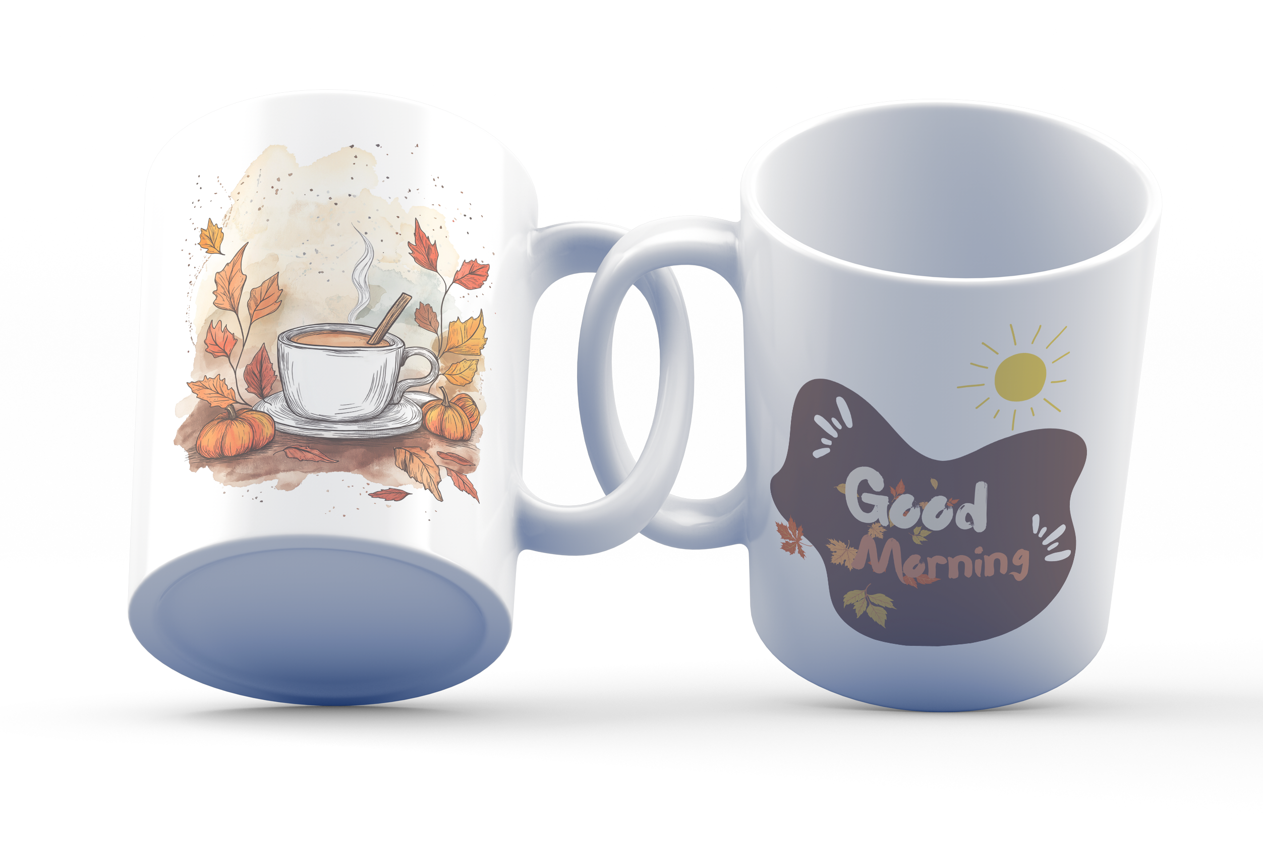 A white ceramic coffee cup with a cozy fall illustration featuring leaves and a steaming cup on one side, and a 'Good Morning' message with a sun and leaves on the other side.