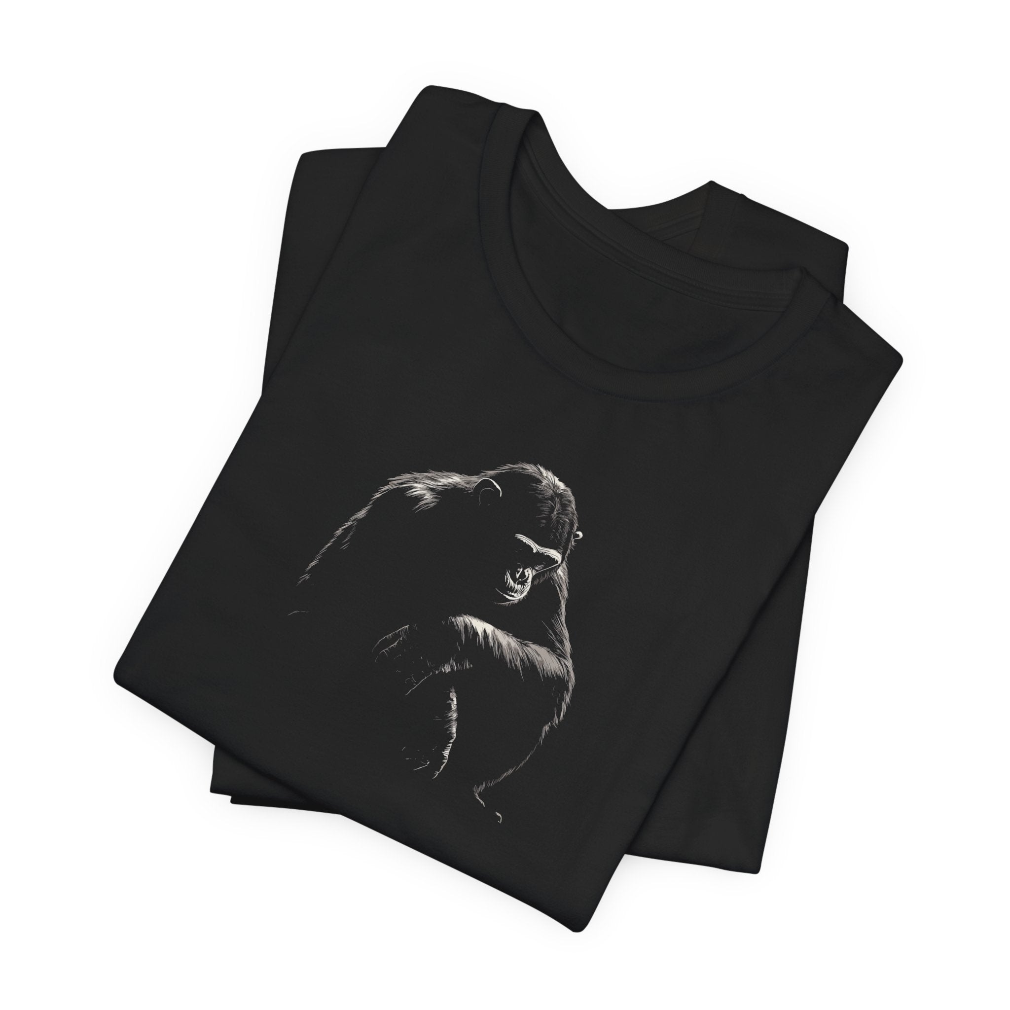 Black cotton t-shirt with a bold monochrome illustration of a gorilla in a kneeling position on the front.