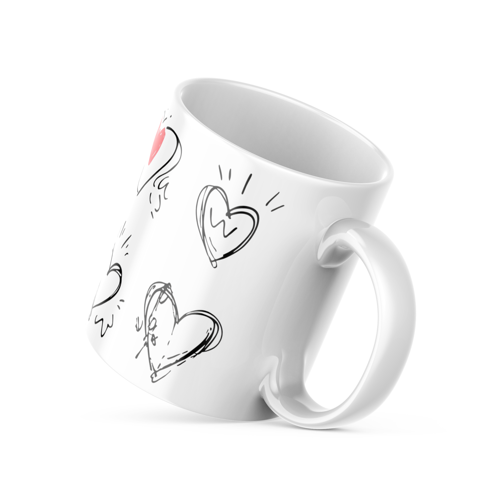 White mug with heart designs on a white background