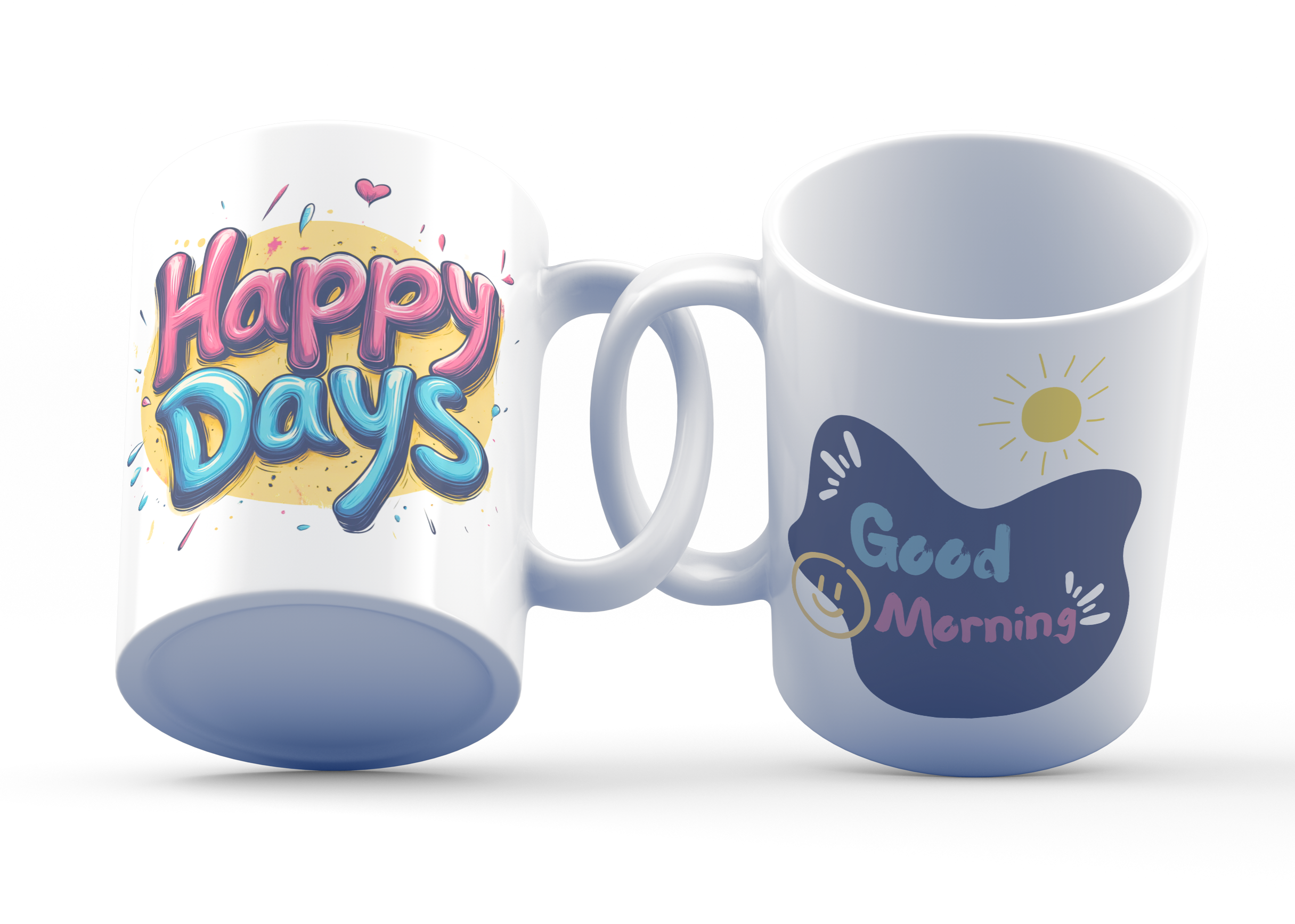 Two white ceramic mugs, one with 'Happy Days' text design in multicolor and the other with 'Good Morning' text design featuring a sun illustration.