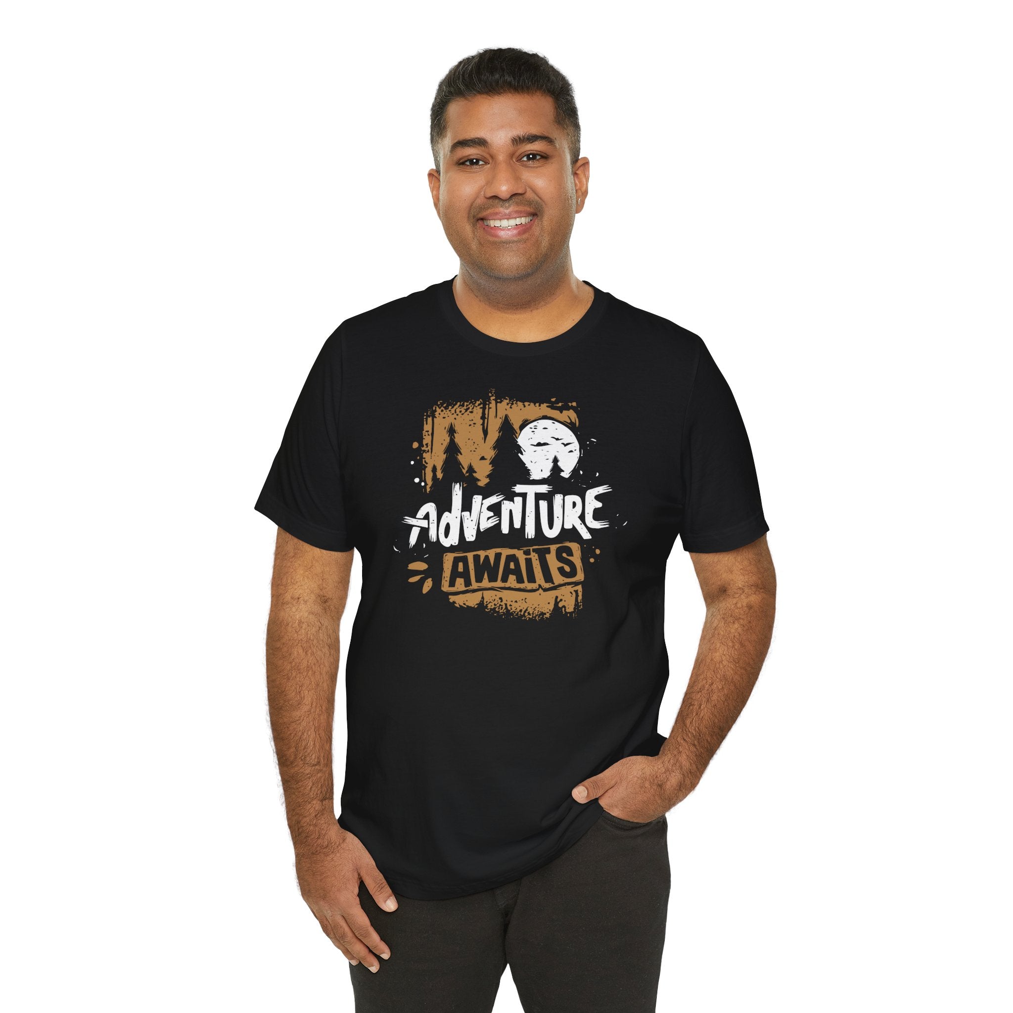 Man wearing a black t-shirt with 'Adventure Awaits' graphic design on a white background