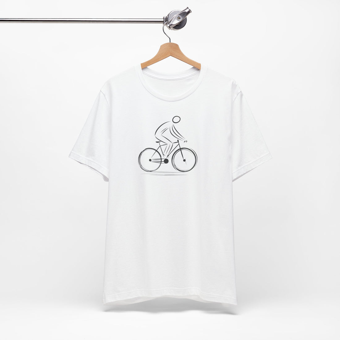 White cotton unisex t-shirt with a minimalist black line art design of a cyclist on a bicycle.