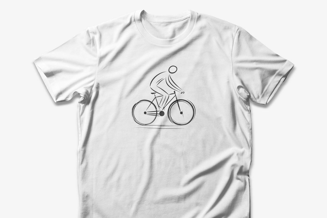 White cotton unisex t-shirt with a minimalist black line art design of a cyclist on a bicycle.