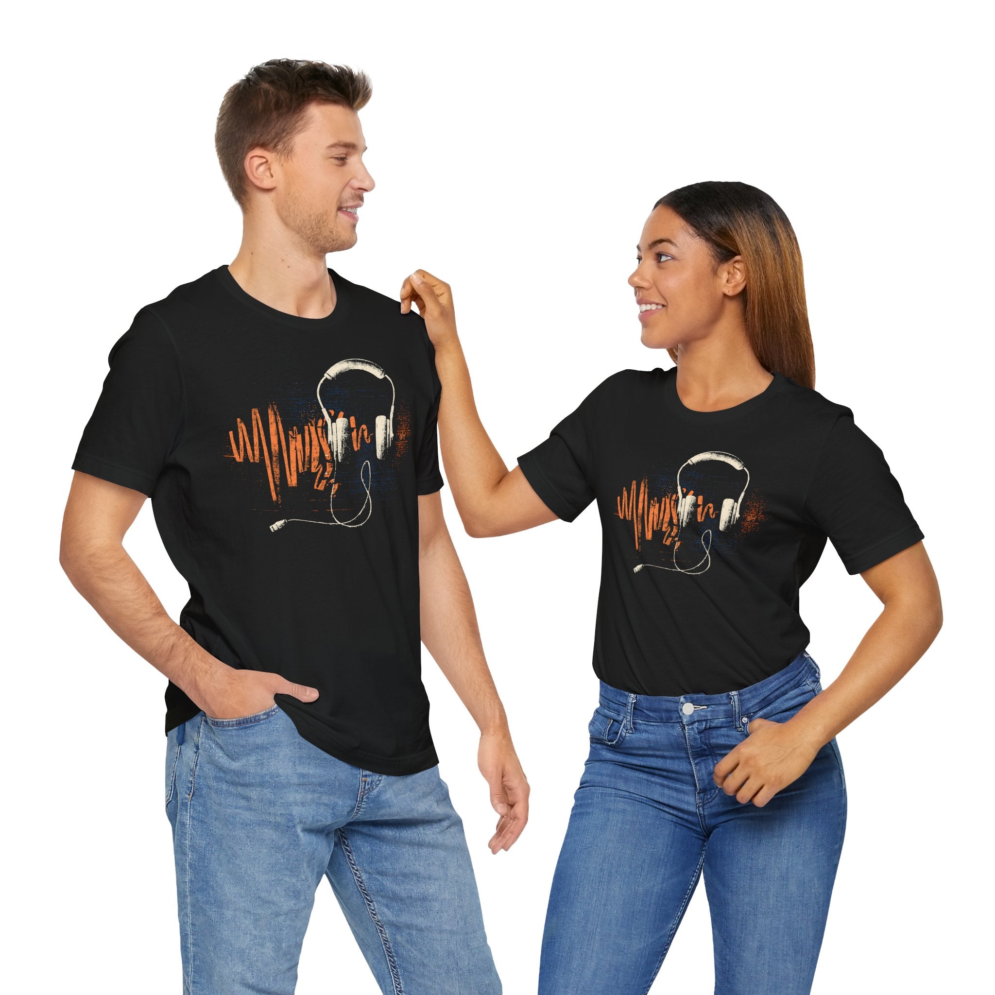 Two people wearing black t-shirts with a graphic design on a white background