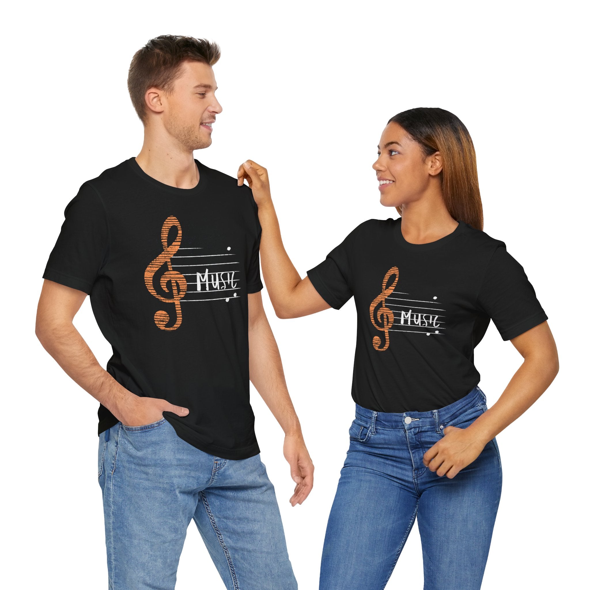 Two people wearing black t-shirts with music-themed designs on a white background
