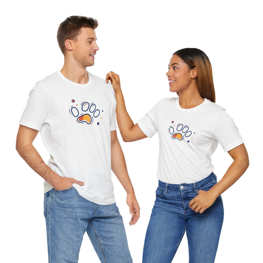A white cotton t-shirt featuring a vibrant geometric paw print design in orange and navy tones, with abstract shapes.