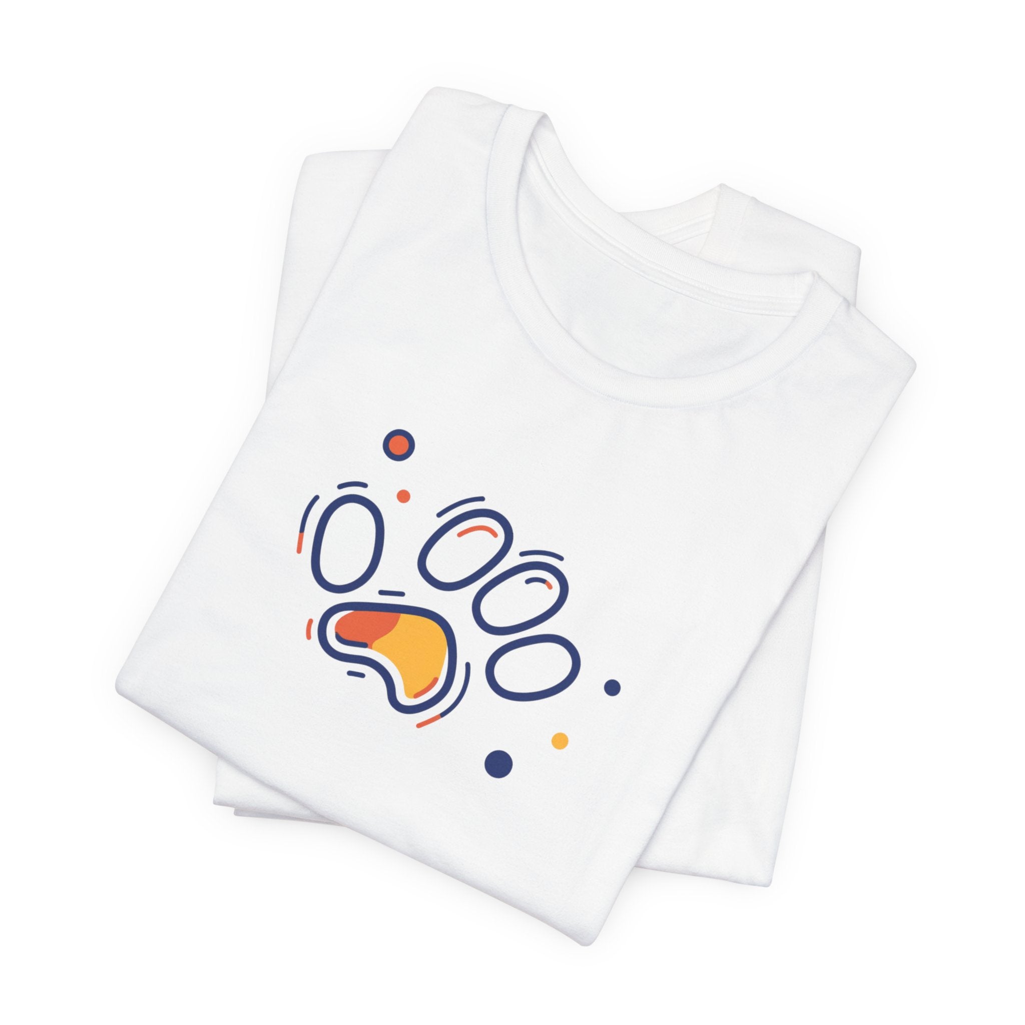 A white cotton t-shirt featuring a vibrant geometric paw print design in orange and navy tones, with abstract shapes.