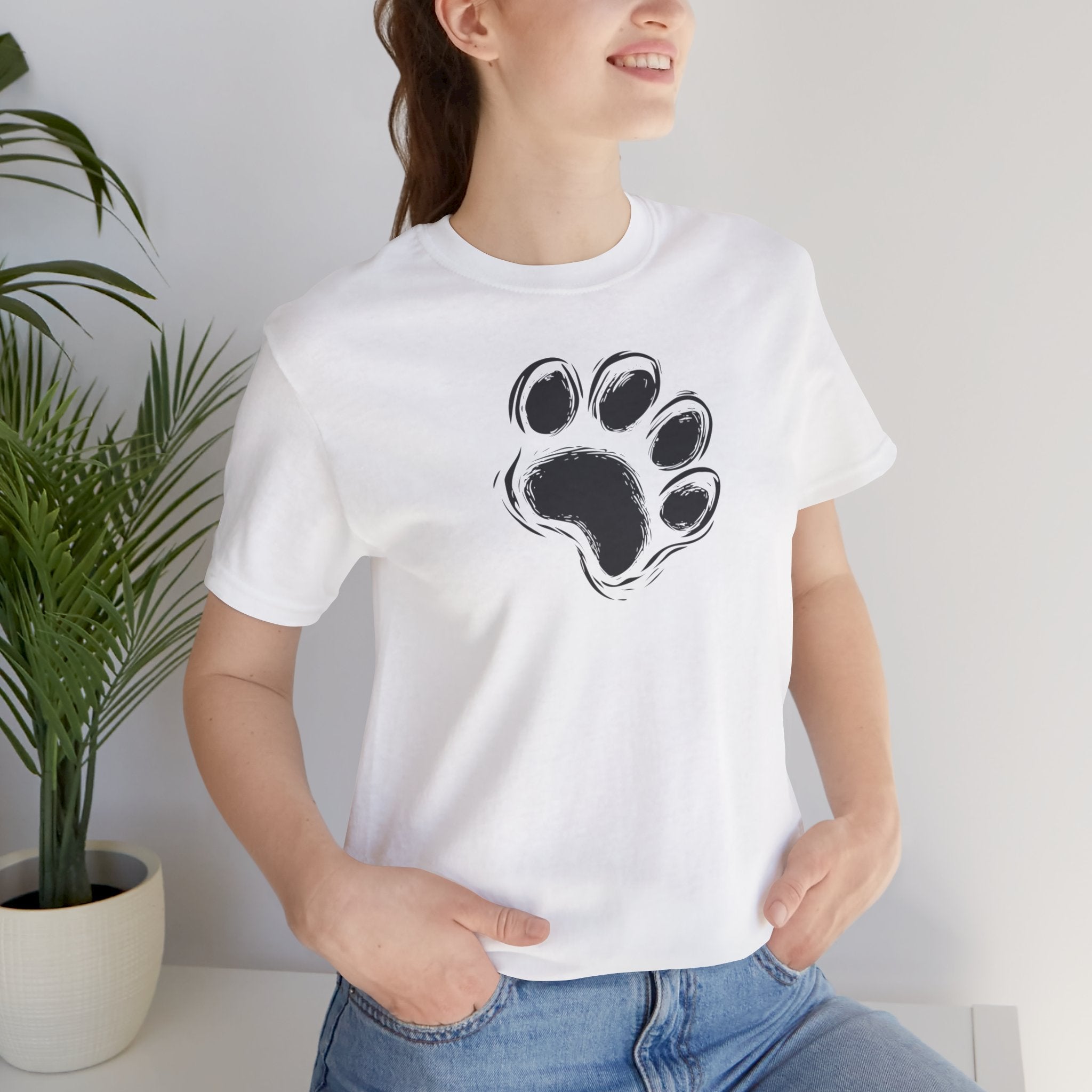 White t-shirt with black paw print minimalist design