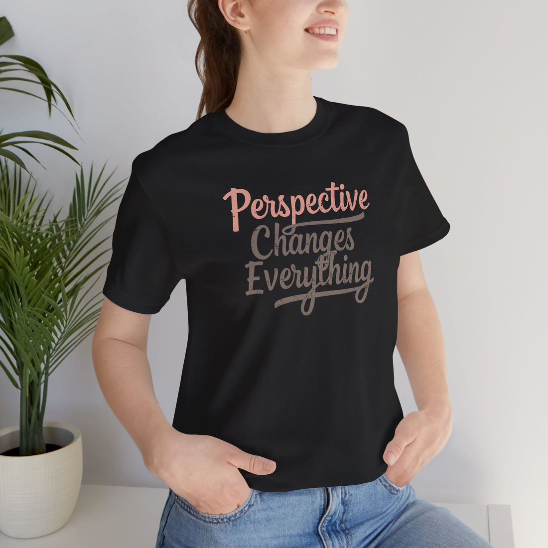 Material closeup: 100% cotton, premium black T-shirt, motivational print detail
