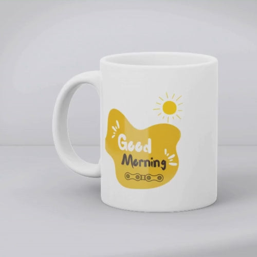 A double-sided ceramic coffee mug with a playful biker design on one side and a 'Good Morning' message with a chain link graphic on the other, displayed against a white background.