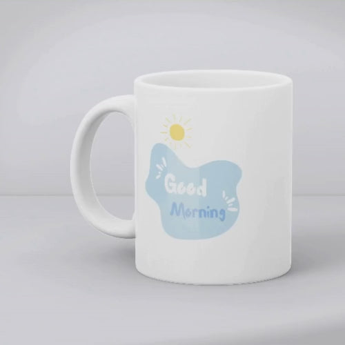 A set of two ceramic mugs, one with a floral watercolor design and the other with a 'Good Morning' message in white text on a blue background, both featuring a handle.