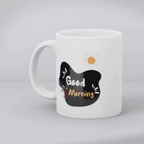 Two ceramic mugs, one with a guitar design and the other with a 'Good Morning' message, both featuring white backgrounds and musical notes.