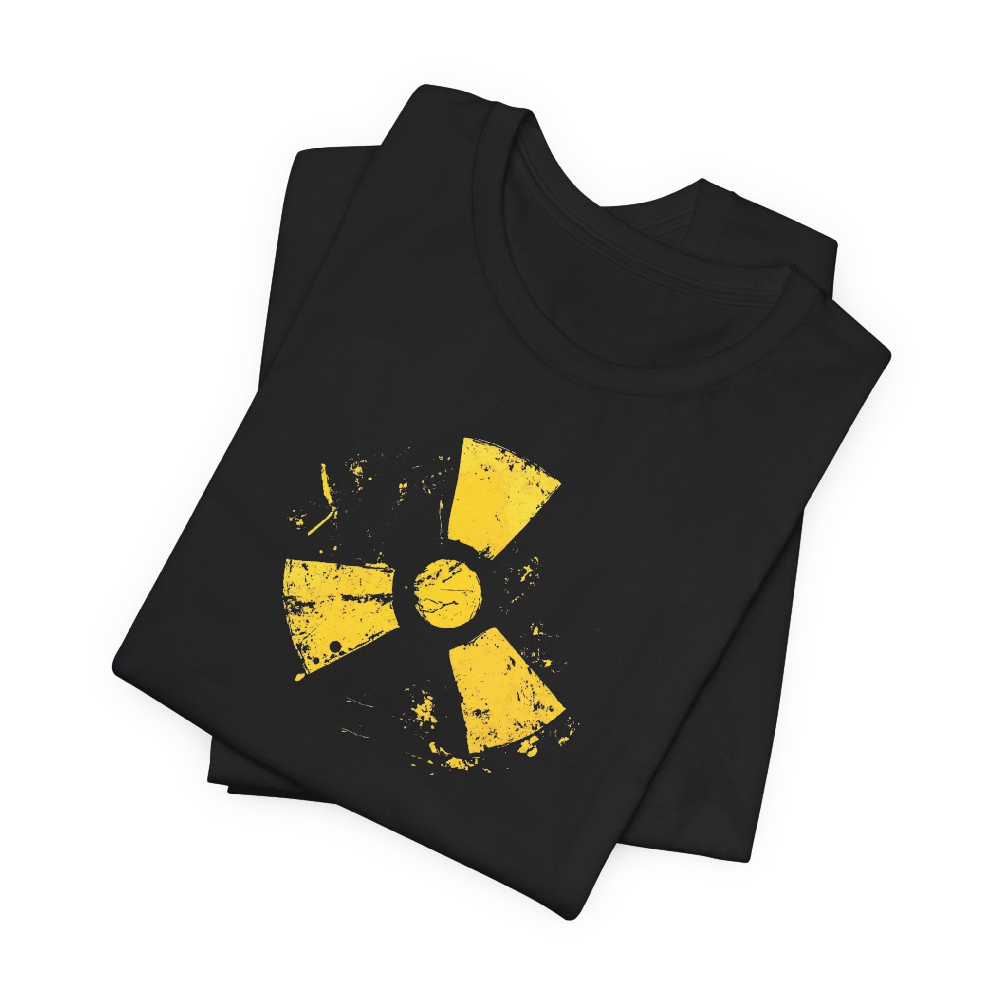 A black cotton tee with a grunge yellow hazard design of a radiation symbol on the front.