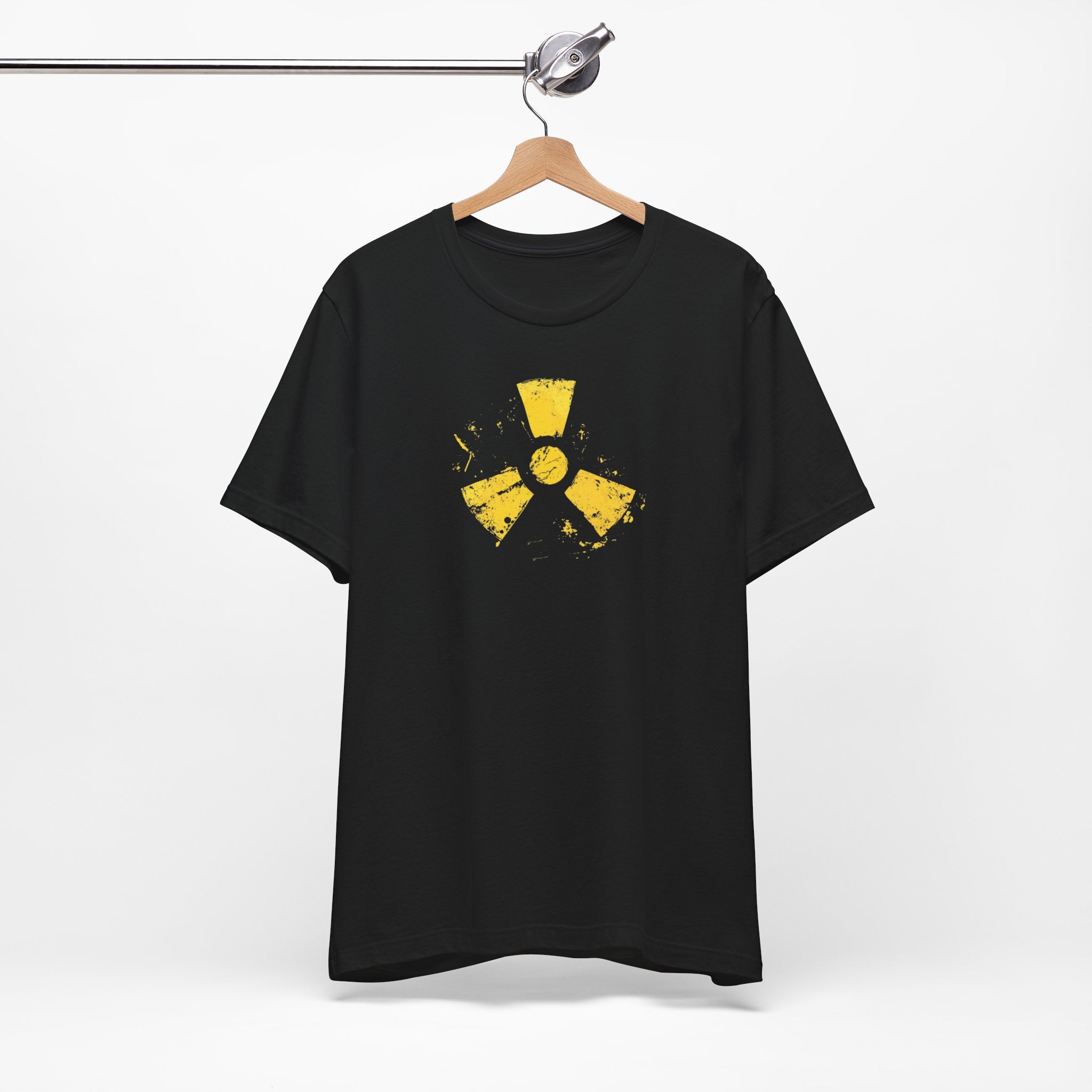 A black cotton tee with a grunge yellow hazard design of a radiation symbol on the front.