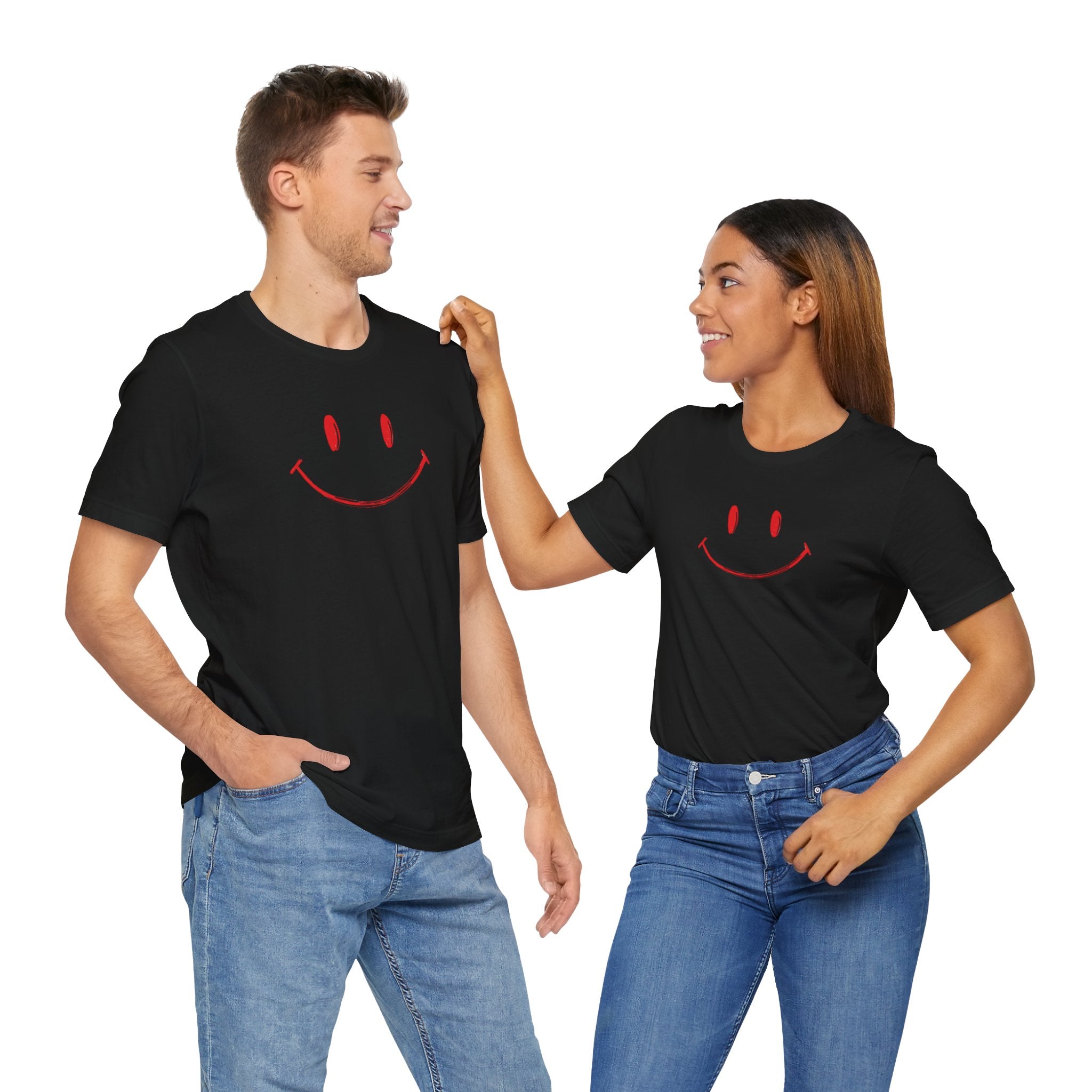 A black crew neck t-shirt with a minimalist hand-drawn red smiley face design on the front.