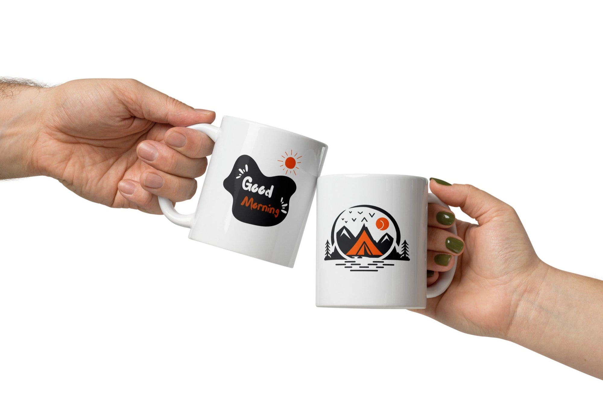Two ceramic mugs with designs. The first mug has a mountain and tent design with a sun, and the second mug has a 'Good Morning' message with a sun symbol.
