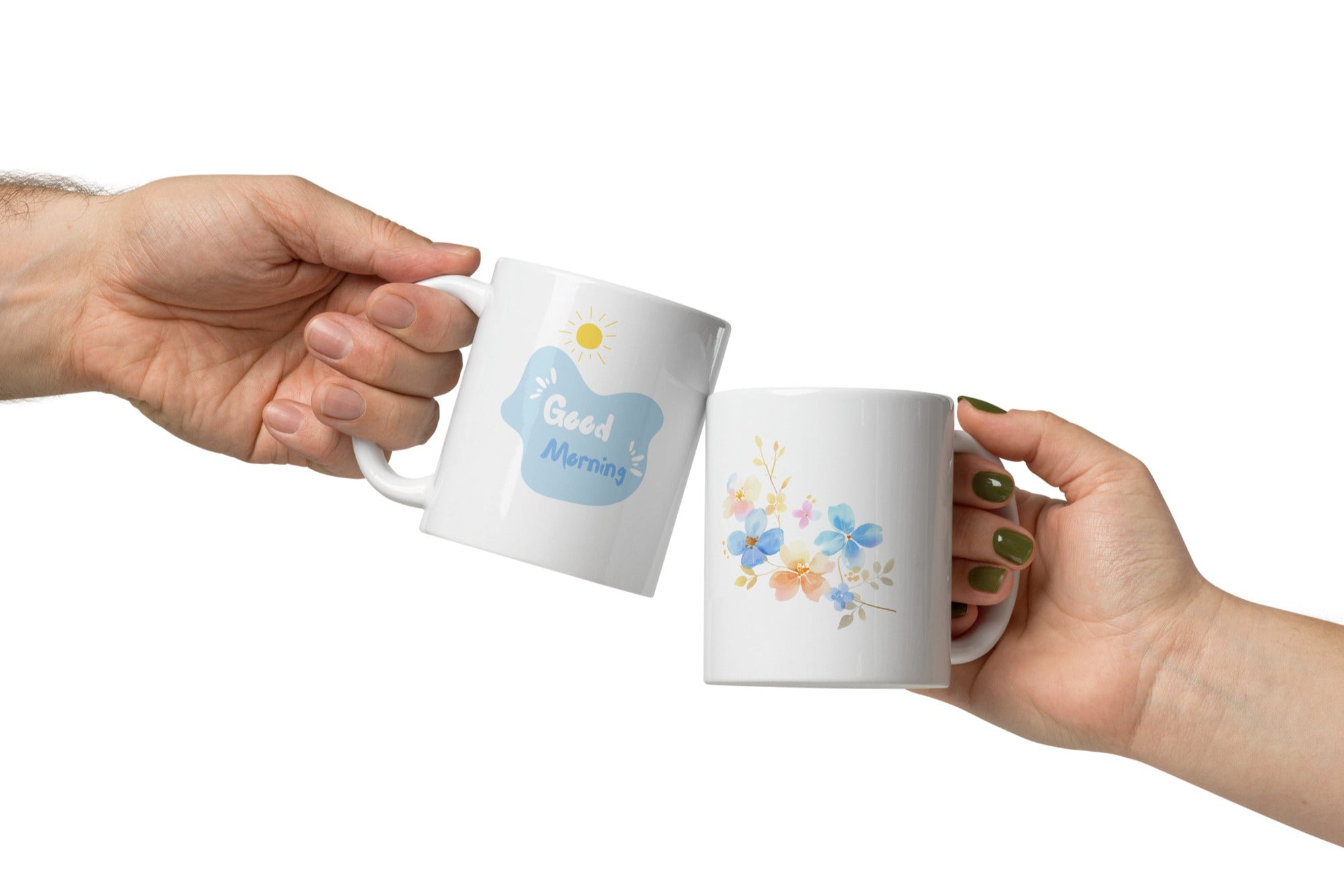 A set of two ceramic mugs, one with a floral watercolor design and the other with a 'Good Morning' message in white text on a blue background, both featuring a handle.