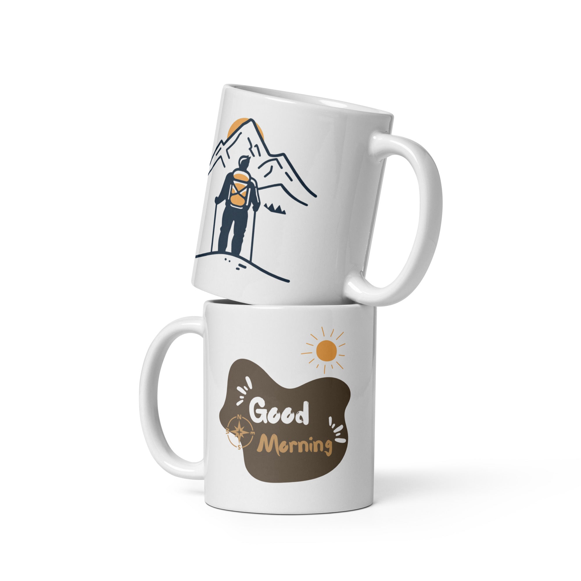 Two ceramic mugs, one with a mountain and sun design and the other with a 'Good Morning' message, both in minimalist style.