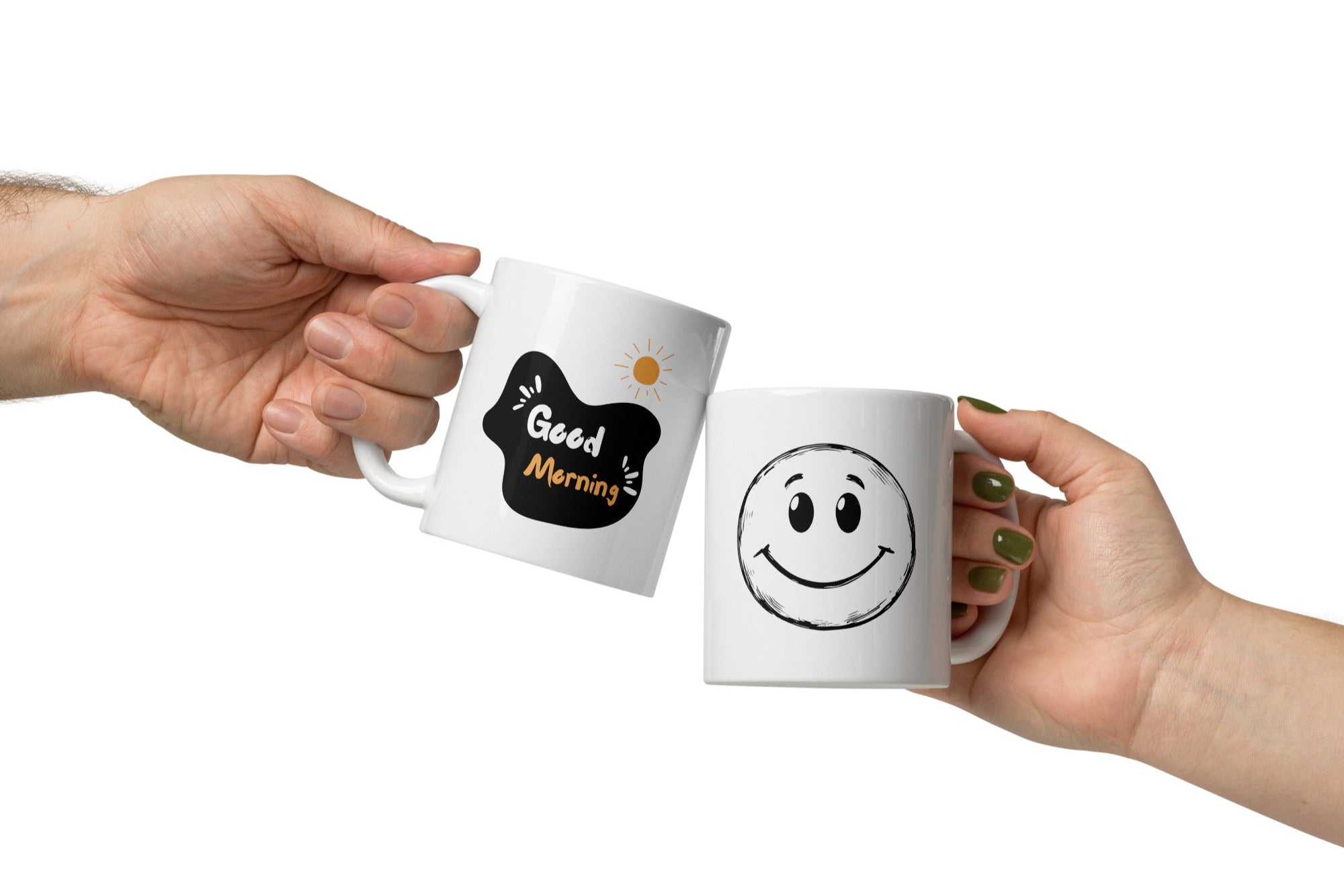 Two white ceramic mugs, one with a hand-drawn smiley face design and the other with a 'Good Morning' message and a sun illustration.