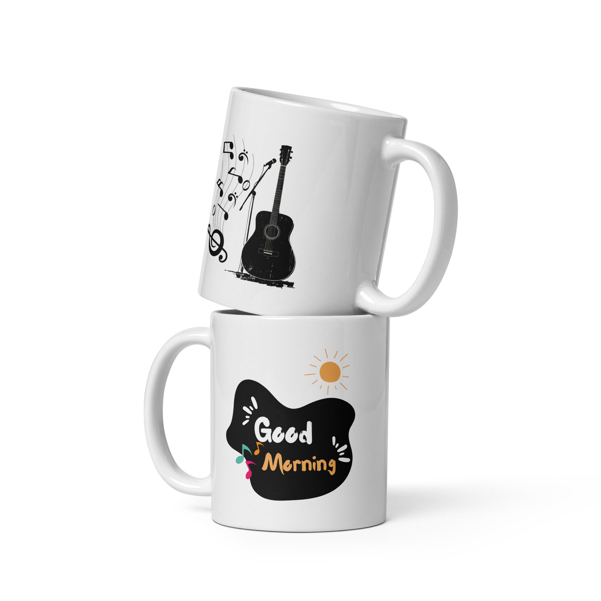 Two ceramic mugs, one with a guitar design and the other with a 'Good Morning' message, both featuring white backgrounds and musical notes.