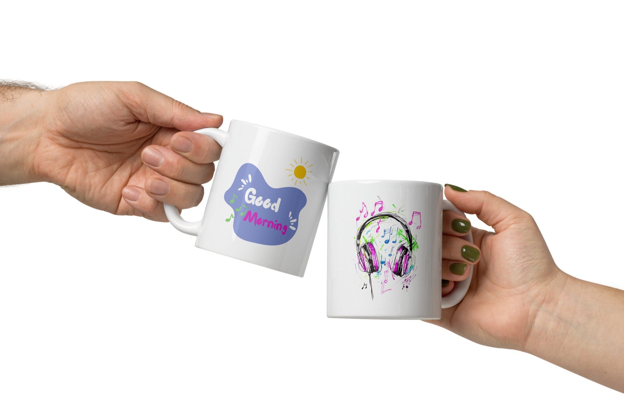 Two ceramic mugs side by side; one with a colorful sketch of headphones and musical notes, and the other with a 'Good Morning' message and a sun icon.