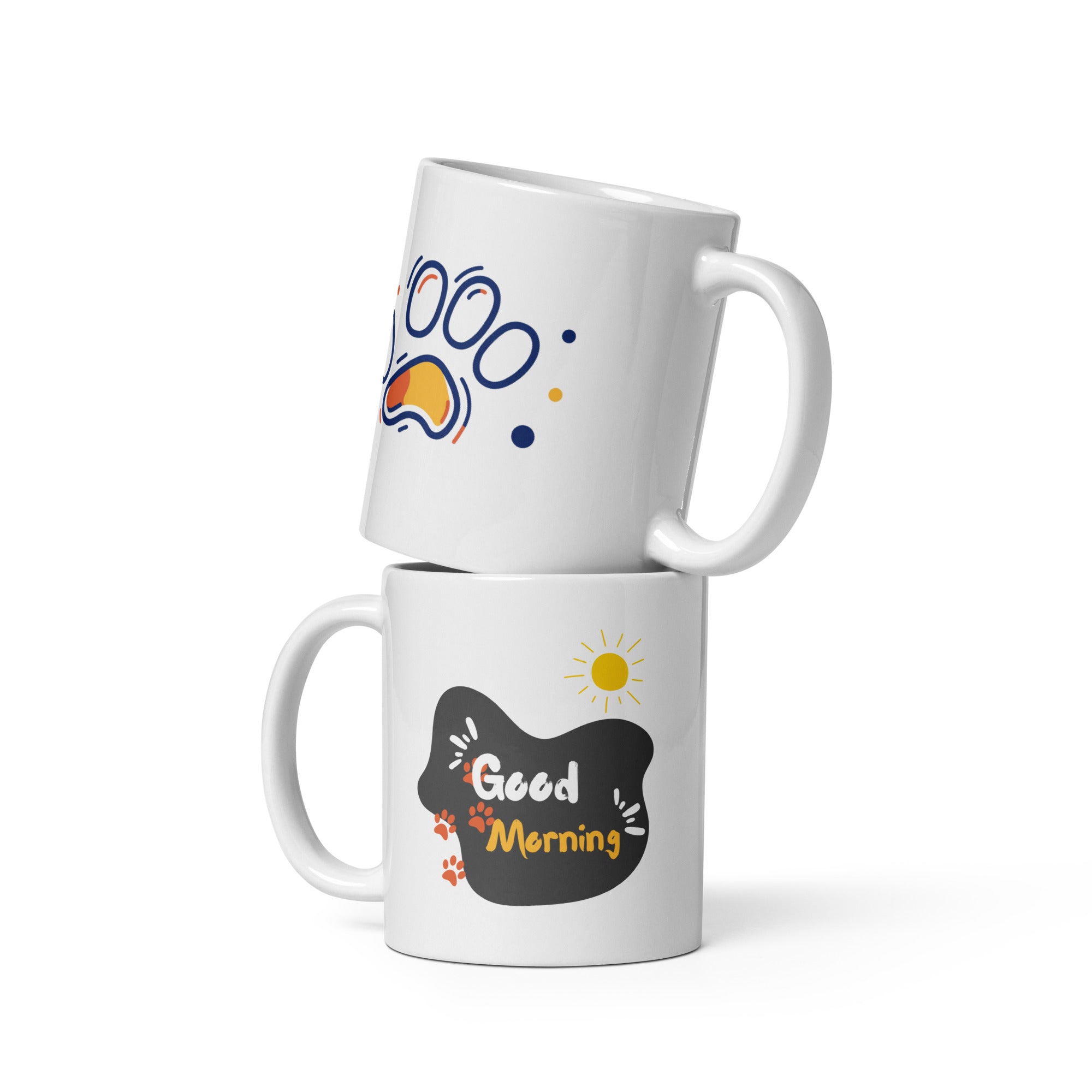 Two ceramic mugs, one with a paw print design and the other with a 'Good Morning' message, both with a white background.