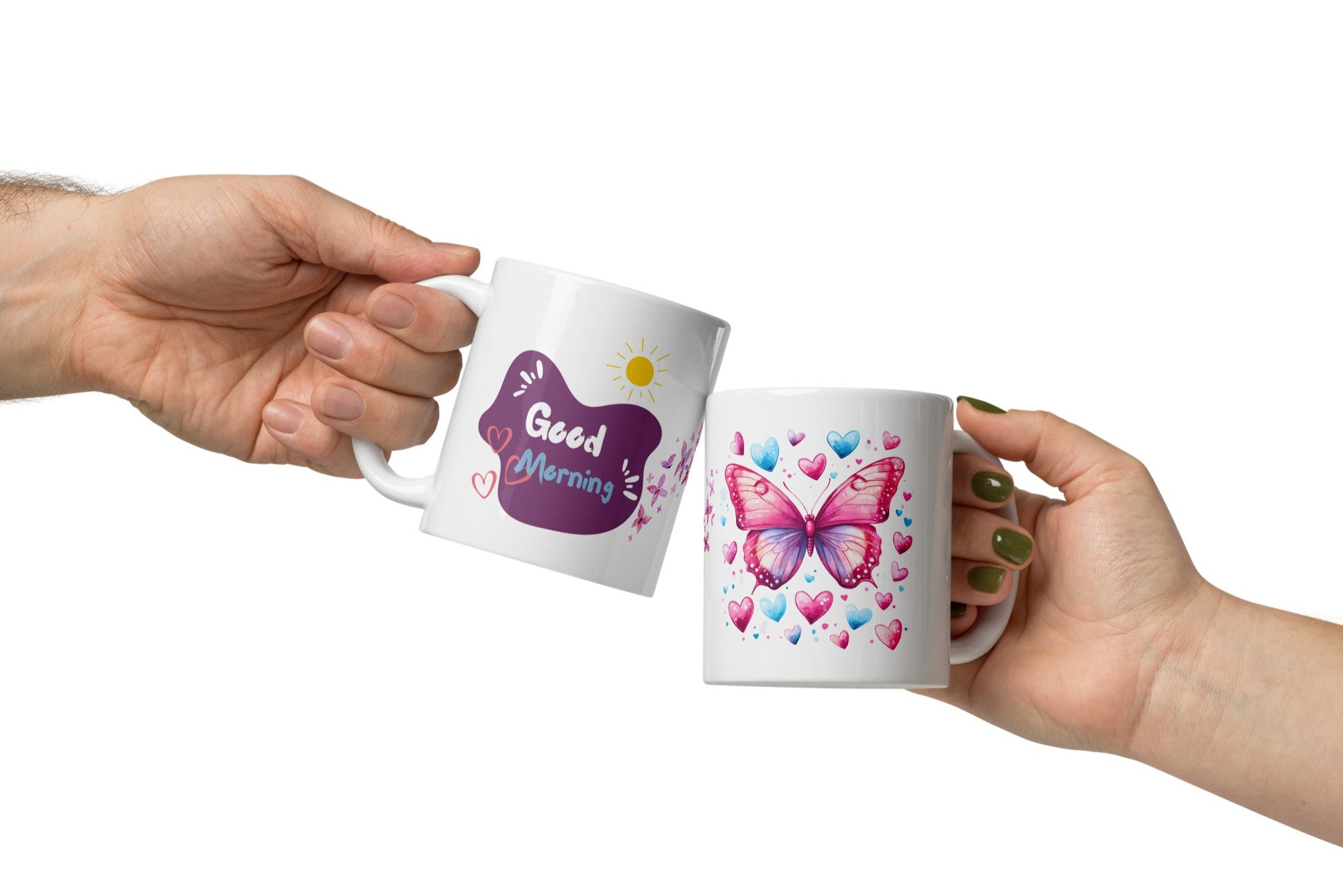 A ceramic coffee cup with a pink butterfly and hearts design, and a text message that reads 'Good Morning'.