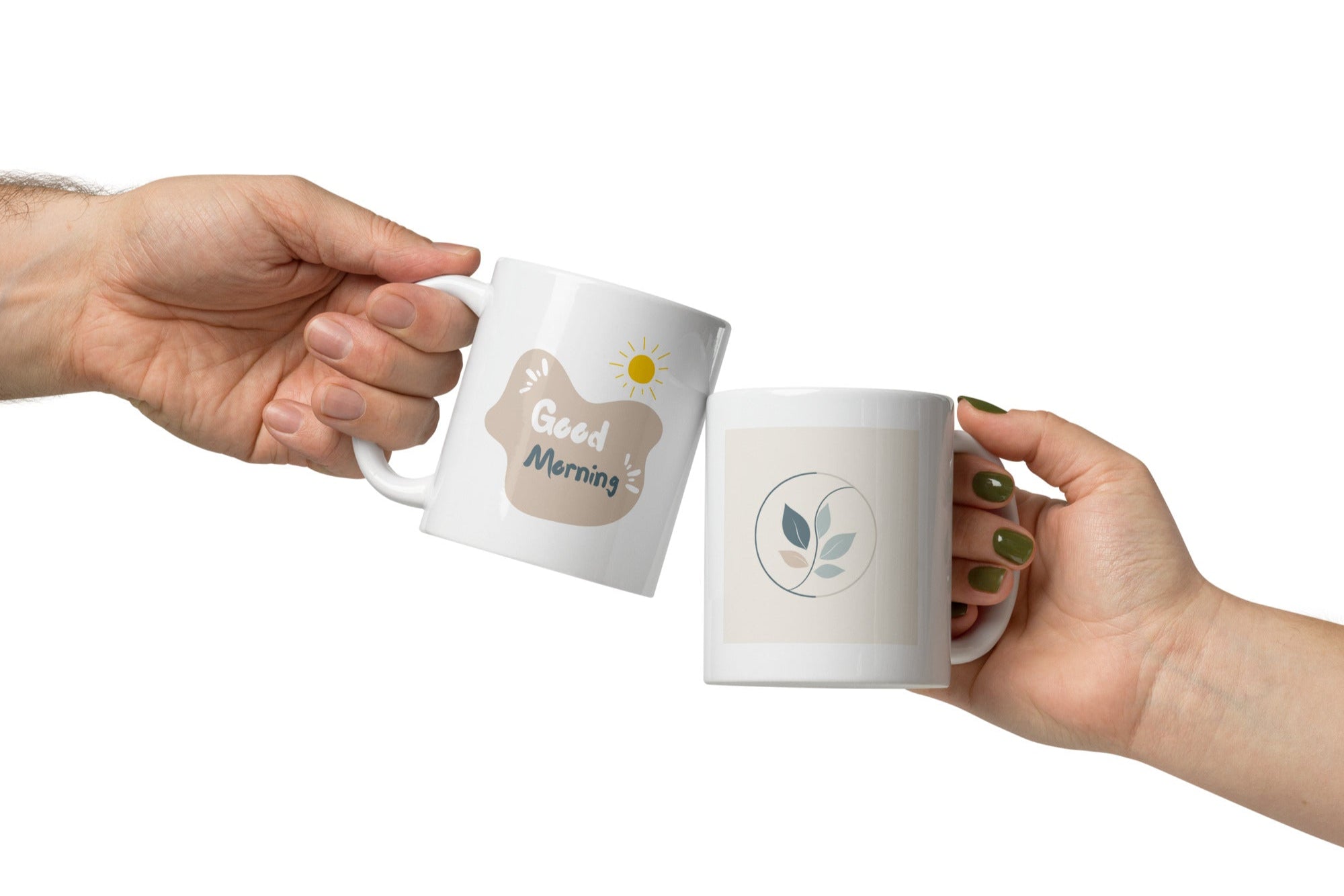 Two ceramic mugs, one with a 'Good Morning' message and a sun icon, and the other with a 'Good Mornin' spelling mistake, both with nature-inspired leaf designs.