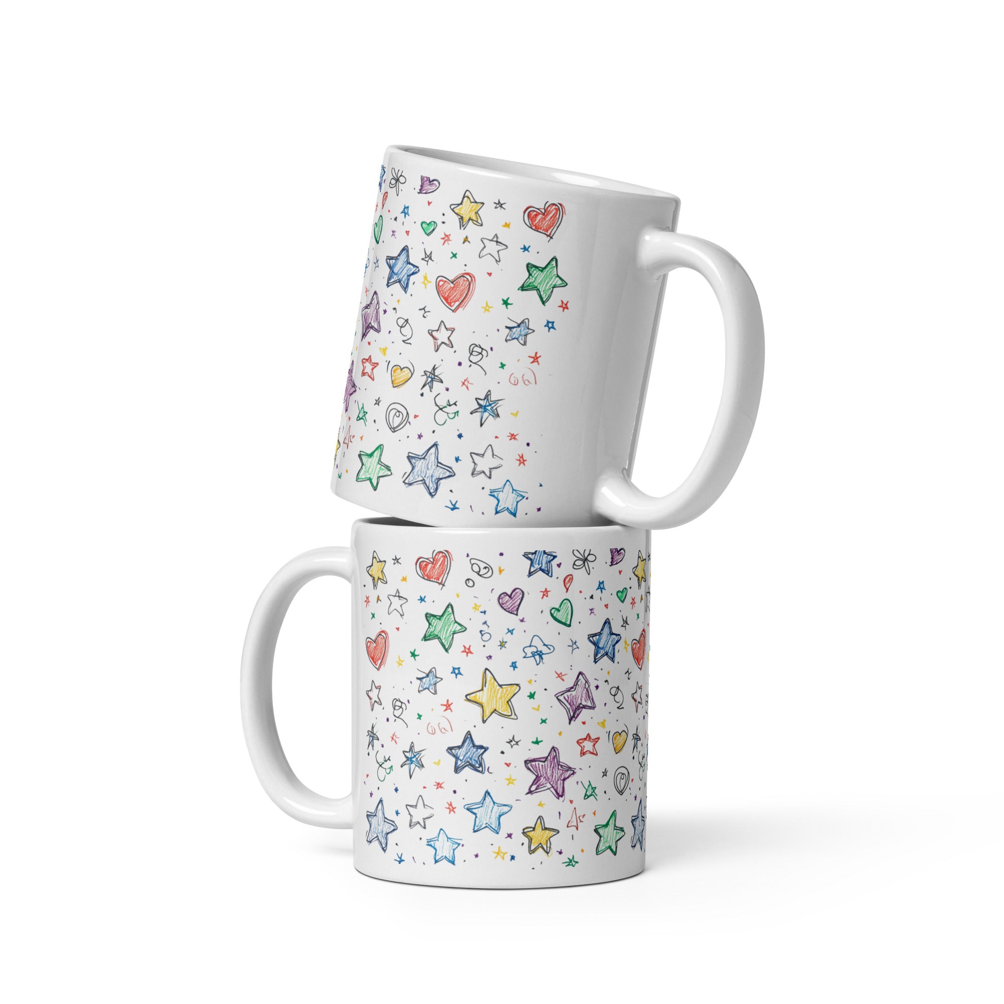 A set of two ceramic coffee mugs with colorful full-wrap designs of stars and hearts on a light background.