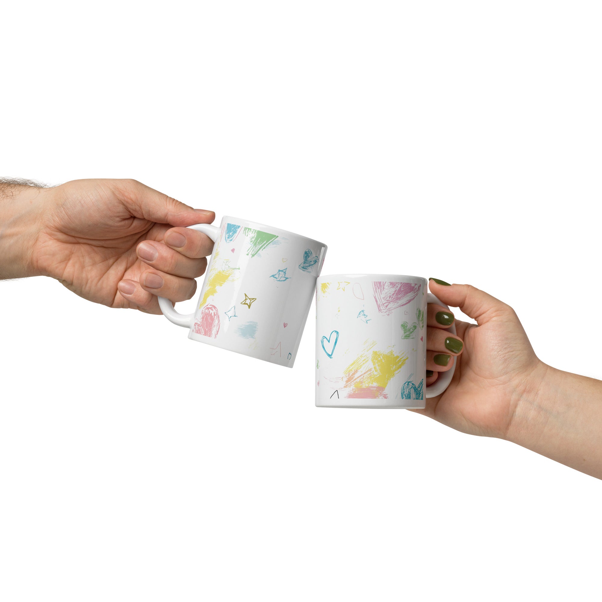 Two hands holding mugs with colorful designs on a white background