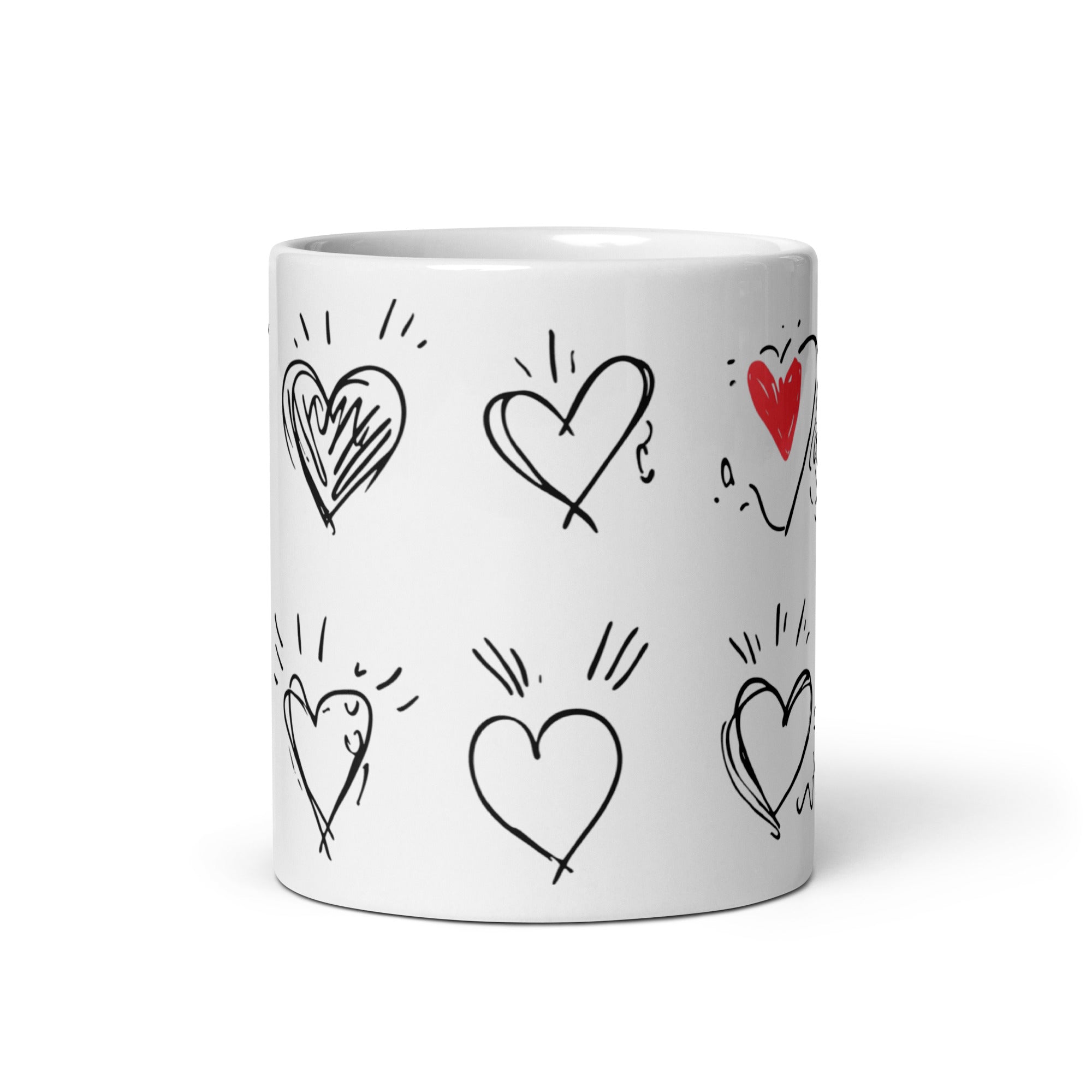 White mug with heart designs on a white background