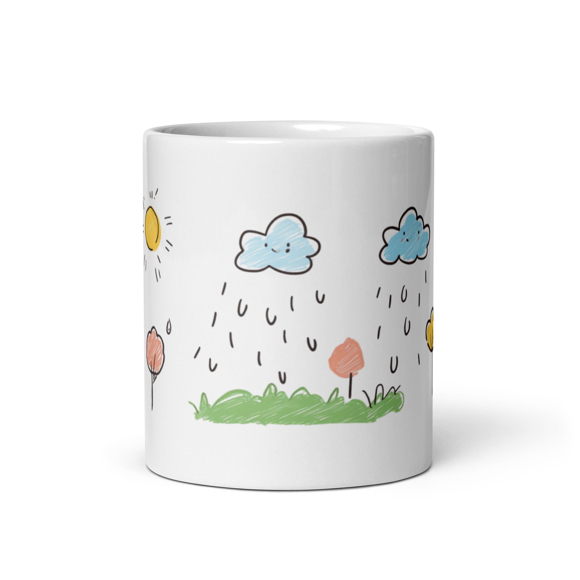 Child’s hands holding kids mug, colorful sun and cloud art