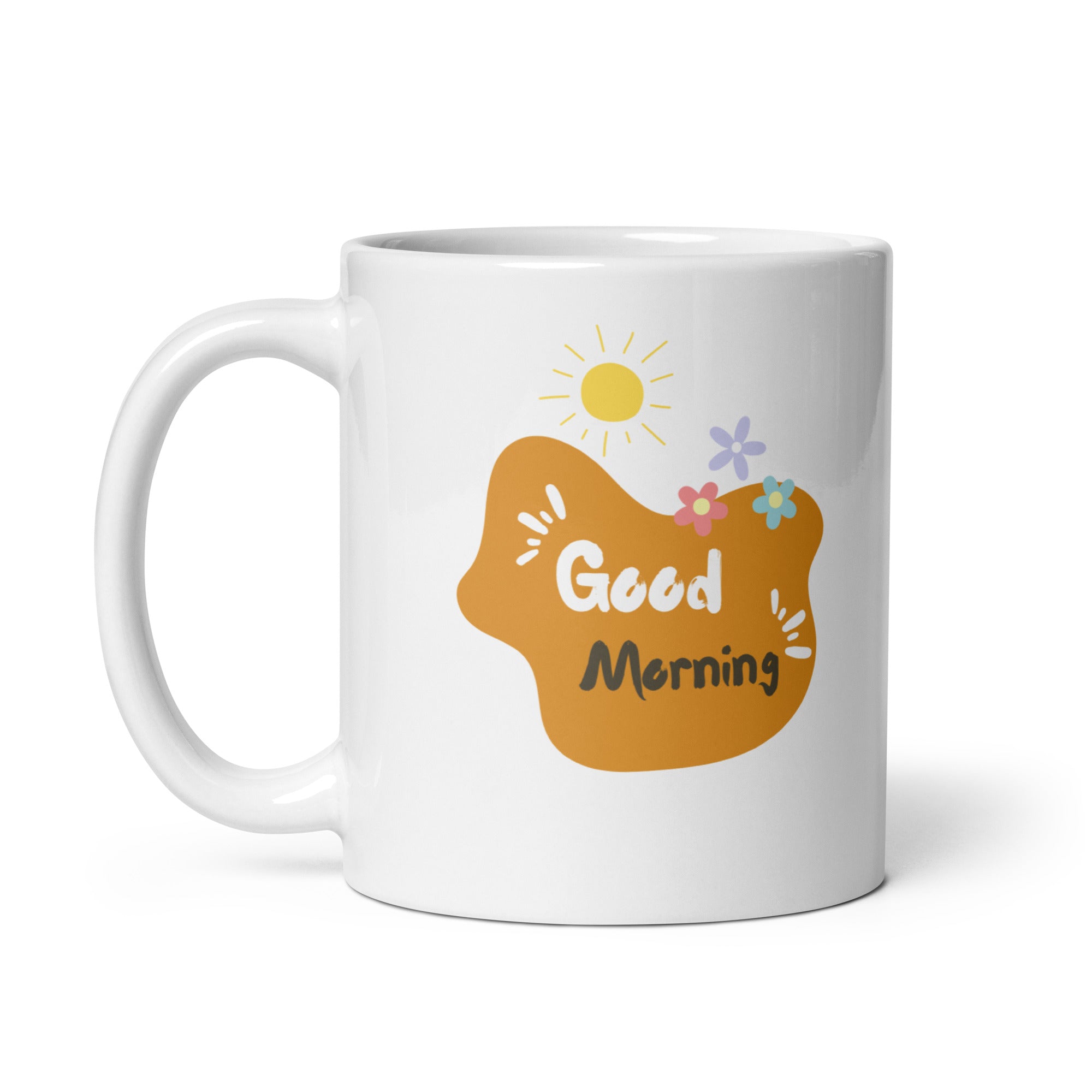 A set of two ceramic mugs, one with a floral design featuring various flowers in earthy tones and the other with a 'Good Morning' message in a golden background. Both mugs have handles and are shown with the inside of one mug facing the viewer.