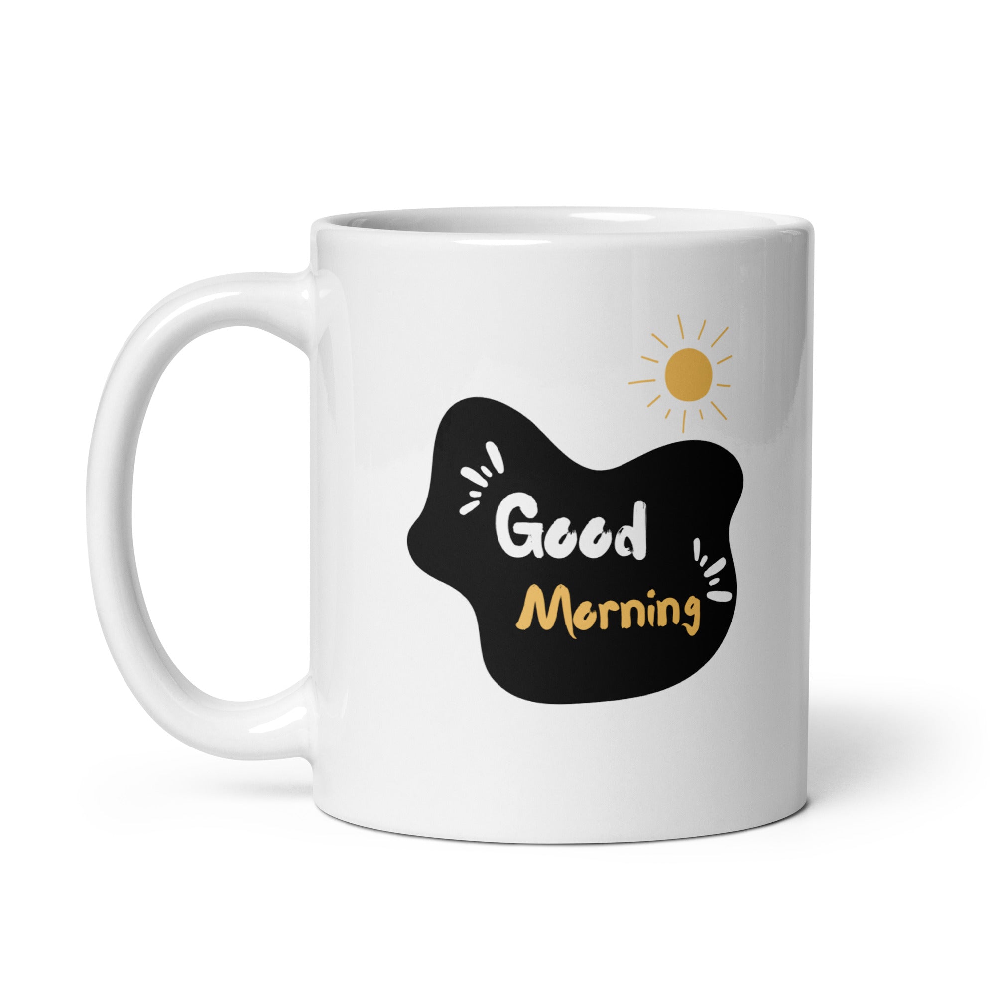 A glossy white ceramic mug with a mountain path design and a text 'GOOD MORNING' on the other side, placed against a plain background.