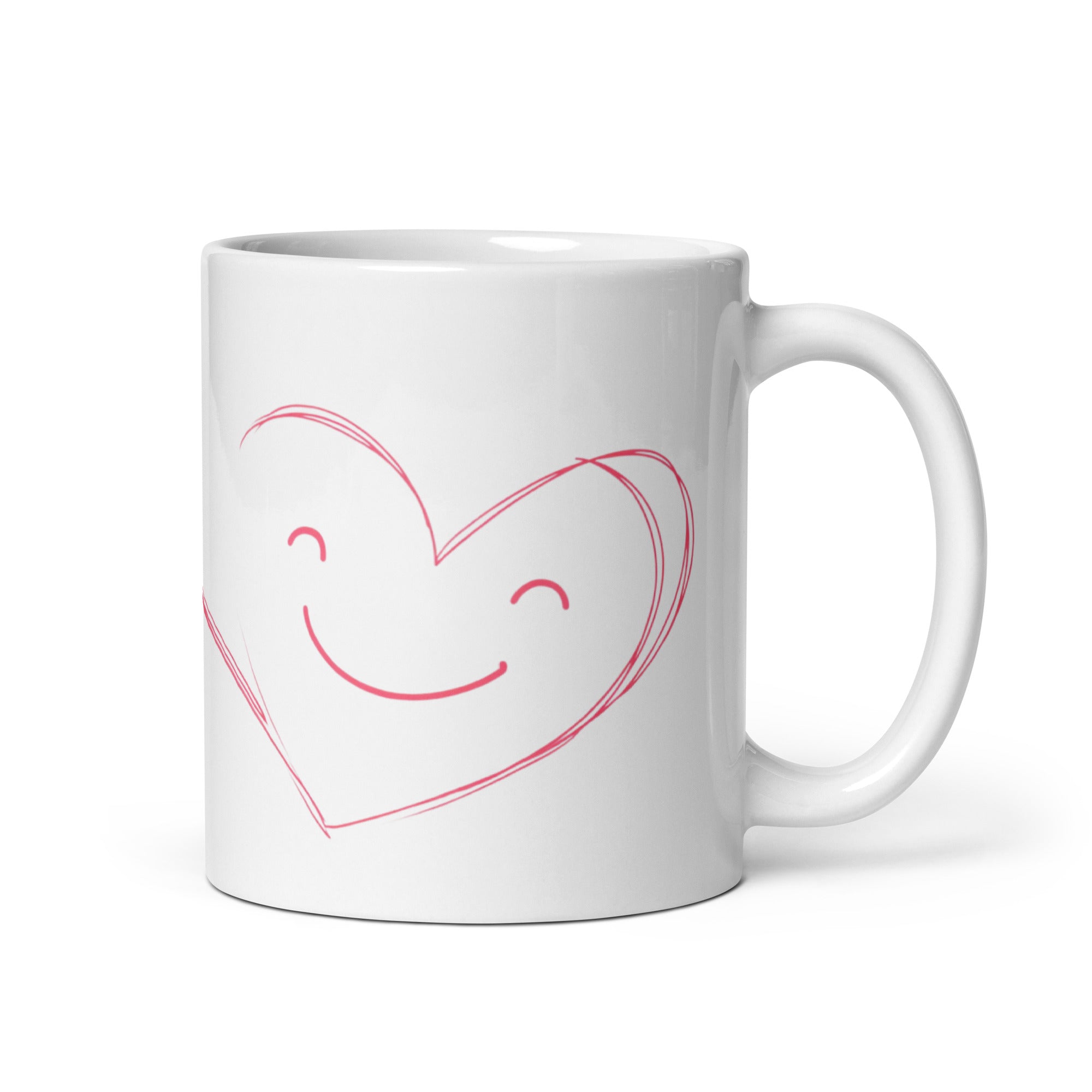 Two ceramic coffee mugs, one with a smiling heart design on the front and the other with a 'Good Morning' message alongside a sun graphic on the front. Both mugs have a white background with text and heart illustrations.